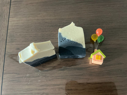 Actual Lustera Naturals Obsidian soap bars with charcoal, slate-grey and ivory layers