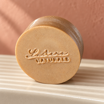 Scalp Sanctuary conditioner bar on an ivory ceramic shelf