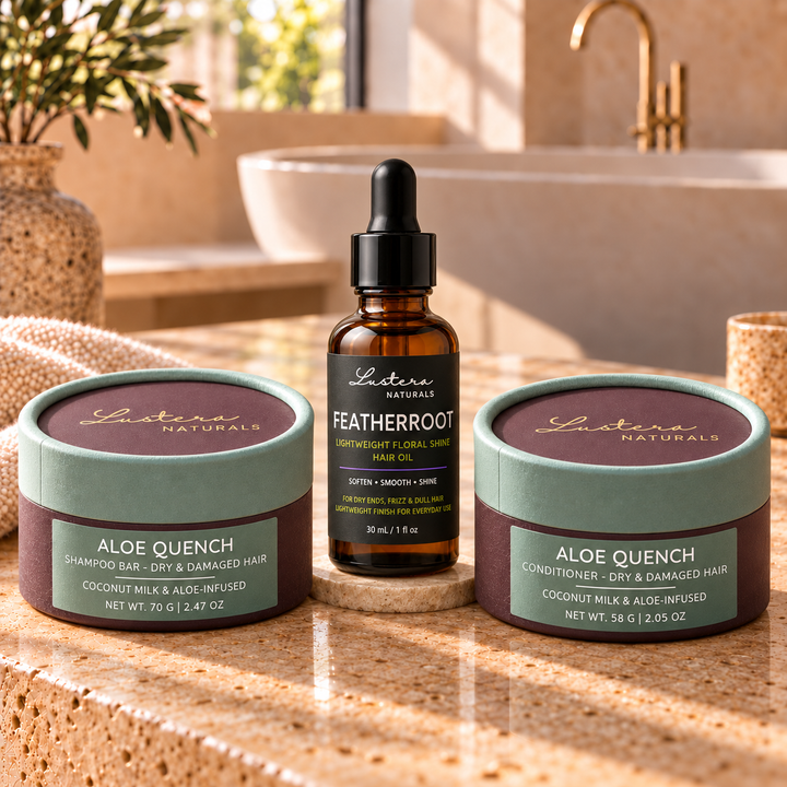 Soft Shine Trio: one 70 g Aloe Quench shampoo bar box, one 58 g Aloe Quench conditioner bar box and one 30 mL FeatherRoot hair oil bottle in a luxury bathroom